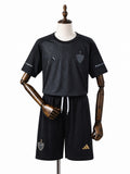 Atlético-MG 25/26 Limited Edition Black Kids Kit Jersey front wood mannequin white background
