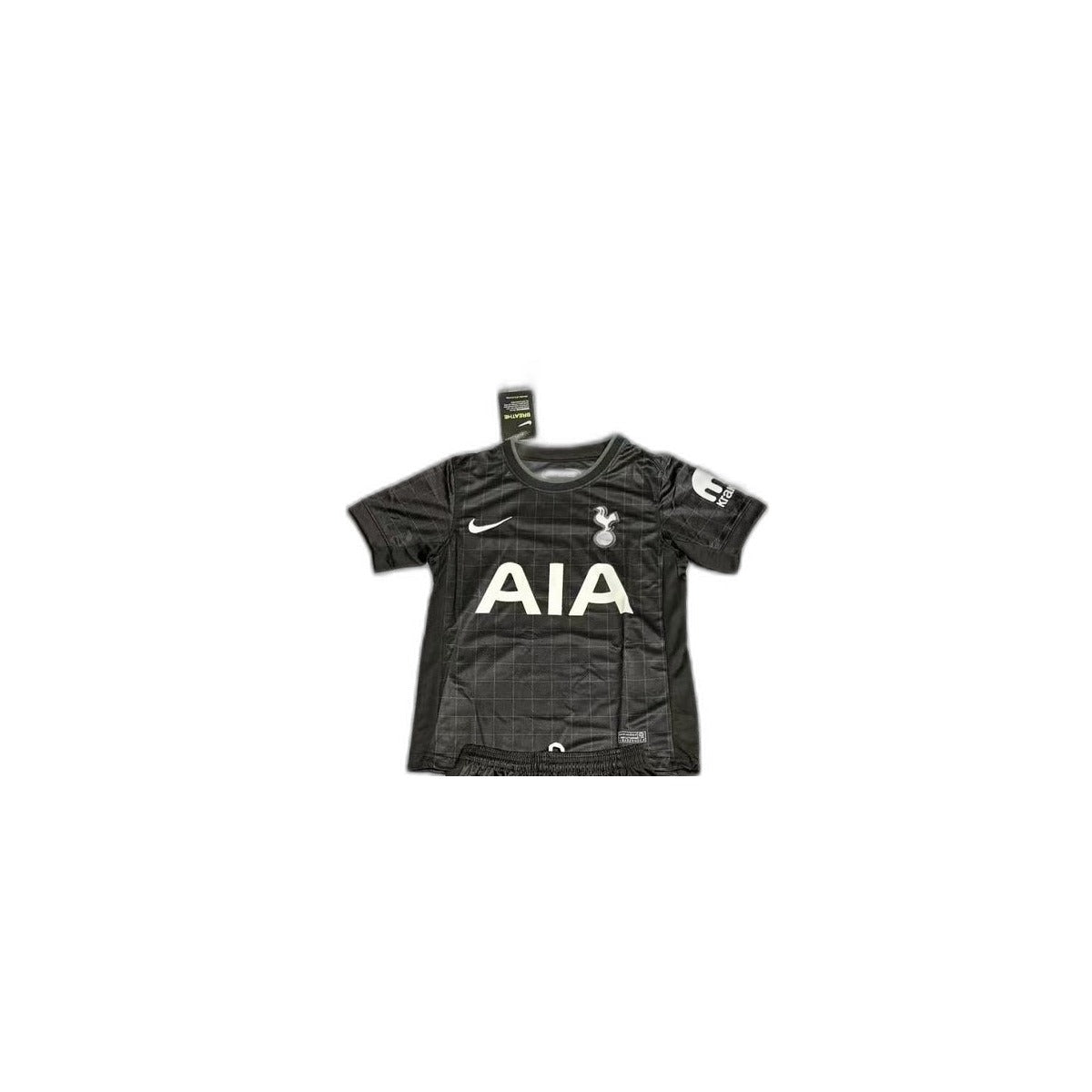 Camisa 2025-26 Tottenham Hotspur Away Infantil detalhe escudo manequim fundo branco