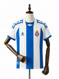 Camisa Espanyol - 1º Uniforme Torcedor 2025/26 frente manequim fundo branco