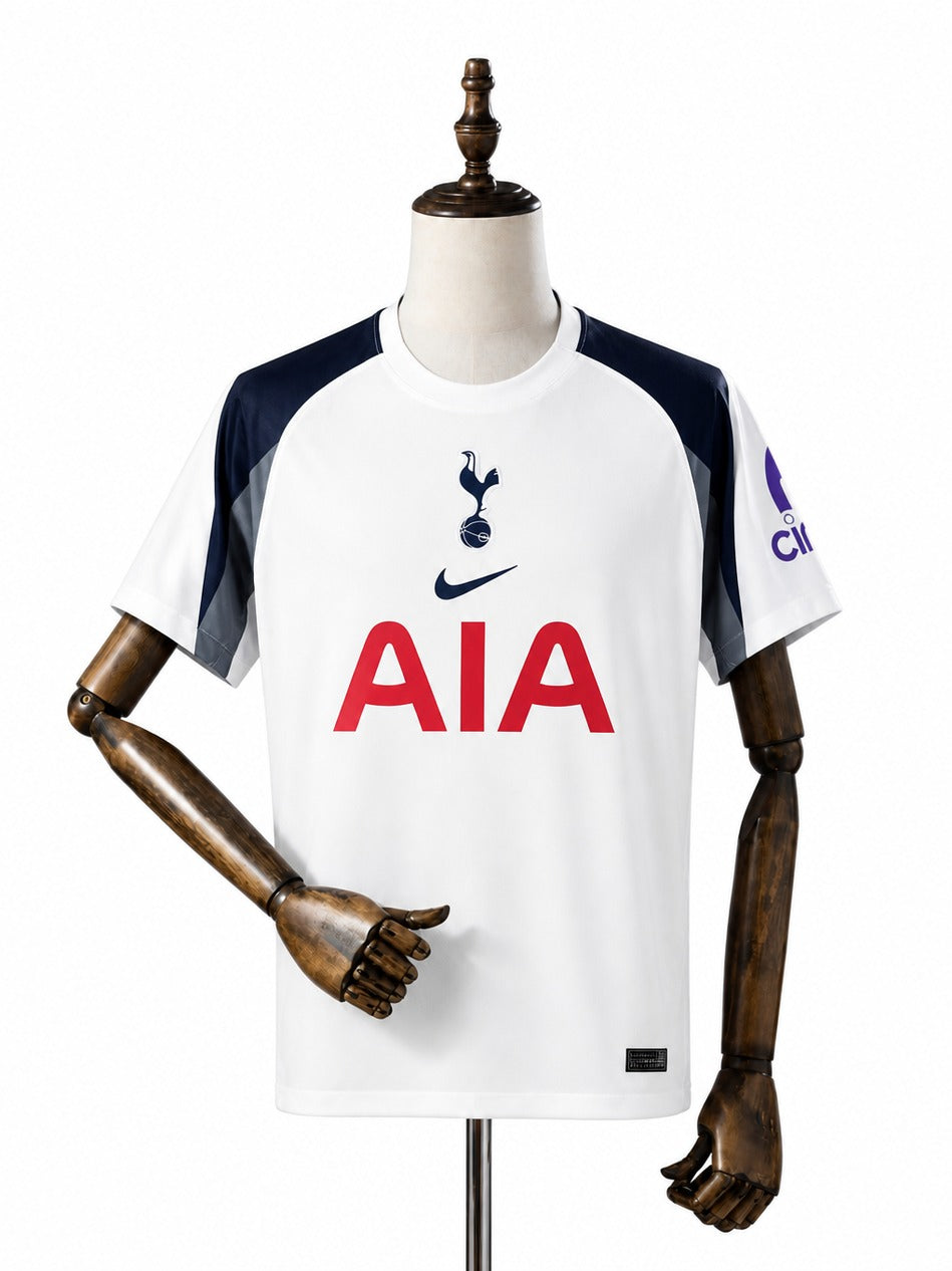 Camisa Tottenham Hotspur - 1º Uniforme Torcedor 2025/26 frente manequim fundo branco