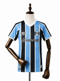 Grêmio Home Kids kit front wood mannequin white background
