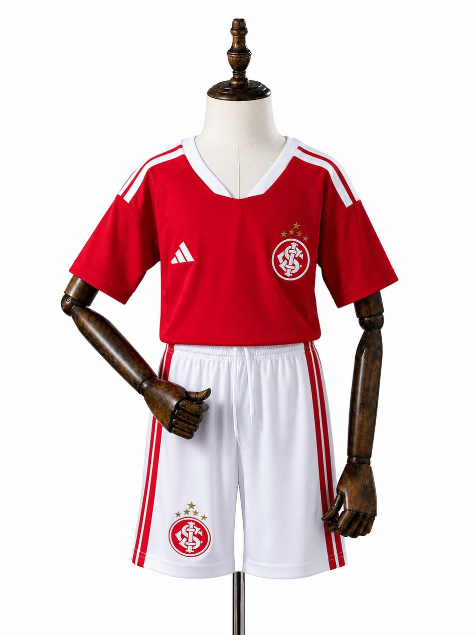 Internacional 2026/27 Home kids kit Jersey front wood mannequin white background