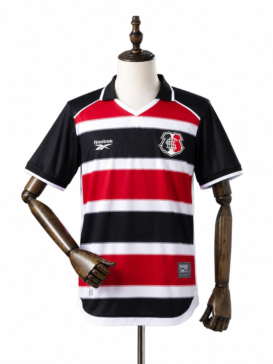 Santa Cruz 26/27 Home Jersey front wood mannequin white background