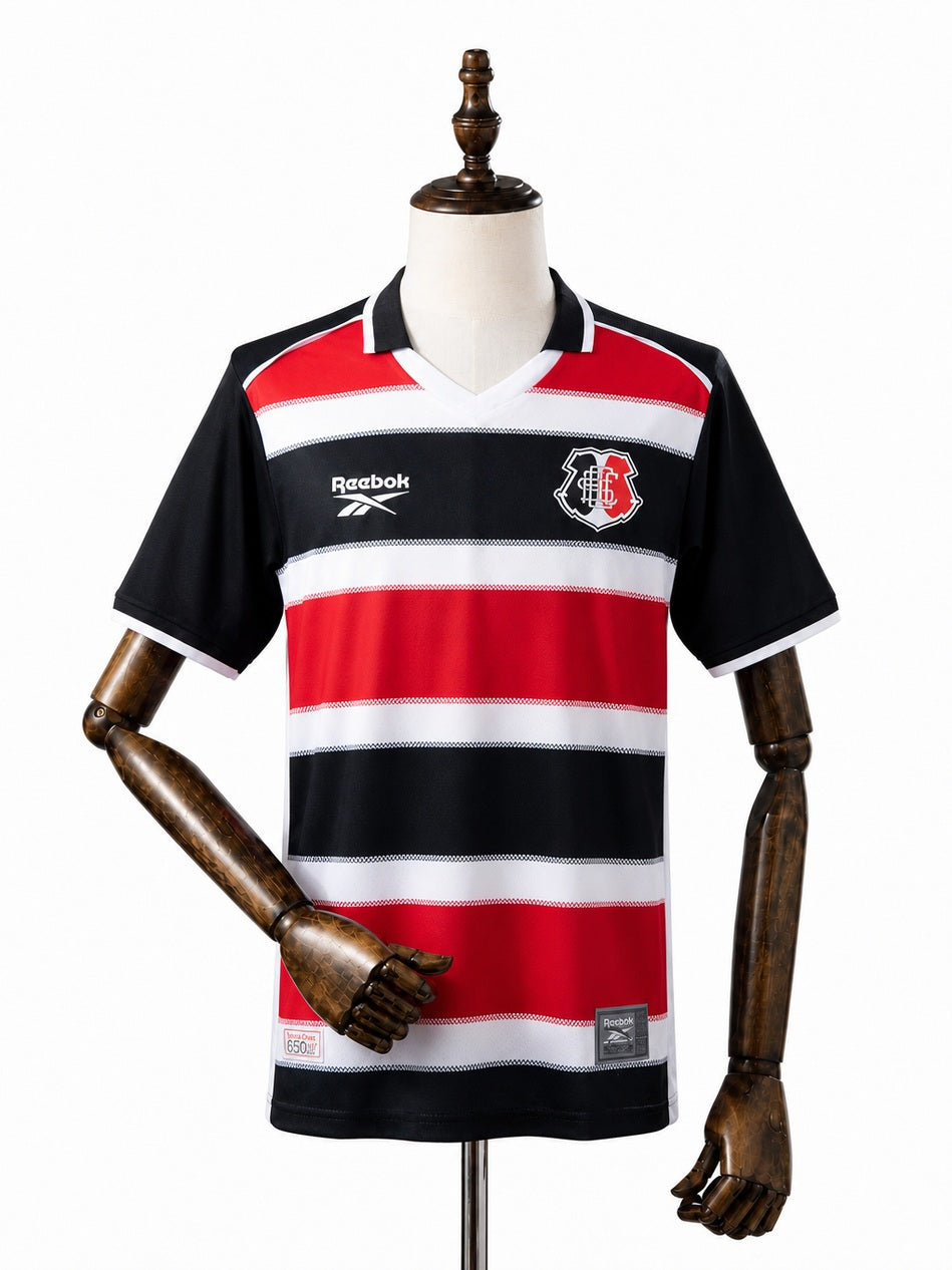 Santa Cruz 26/27 Home Jersey front wood mannequin white background