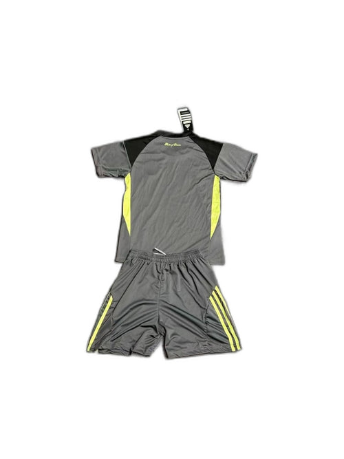 Camisa 2025-26 Manchester United Grey Infantil verso fundo branco