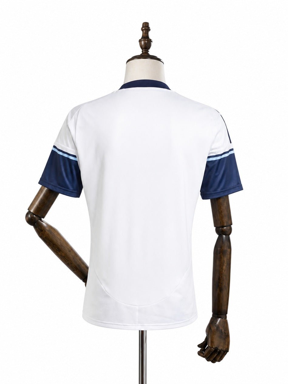 Camisa Vancouver Whitecaps - 1º Uniforme Torcedor 2025 verso manequim fundo branco