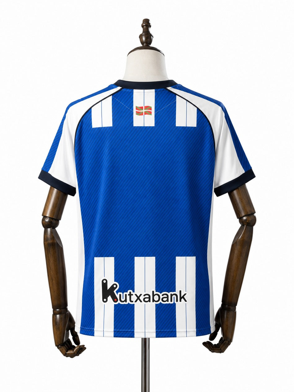 Camisa Real Sociedad - 1º Uniforme Torcedor 2025/26 verso manequim fundo branco